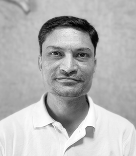 Dr. Kartik Microbiology and QC - Dholakia Tobacco Pvt. Ltd.